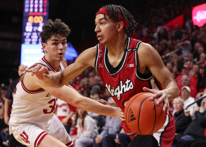 Rutgers Scarlet Knights guard Derek Simpson (0) drives to the basket against Indiana Hoosiers guard Trey Galloway (32) during the second half at Jersey Mike's Arena.